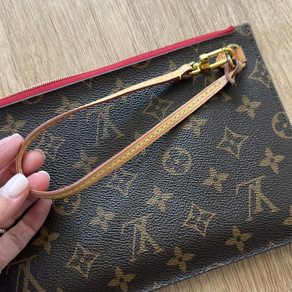 Authentic Louis Vuitton wristlet that comes in the never full. - Picture 4 of 6